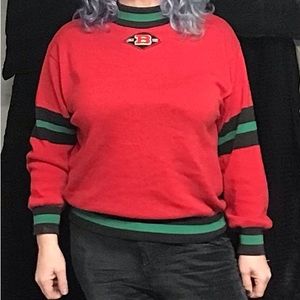 Benetton surely United these Colors with this vintage banger of a sweater